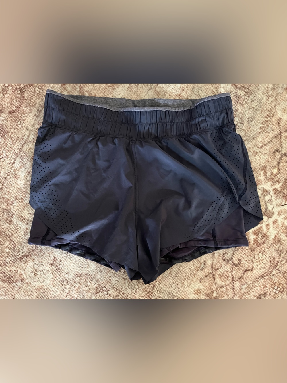 Lululemon Women's Black Athletic Running Shorts with Laser-Cut Venting